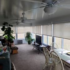 Installed roller shades to sun room