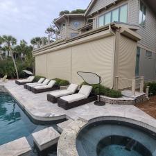 Motorized Fortified Storm Protection Rolling Shutters on Whistling Swan Rd in Hilton Head Island, SC